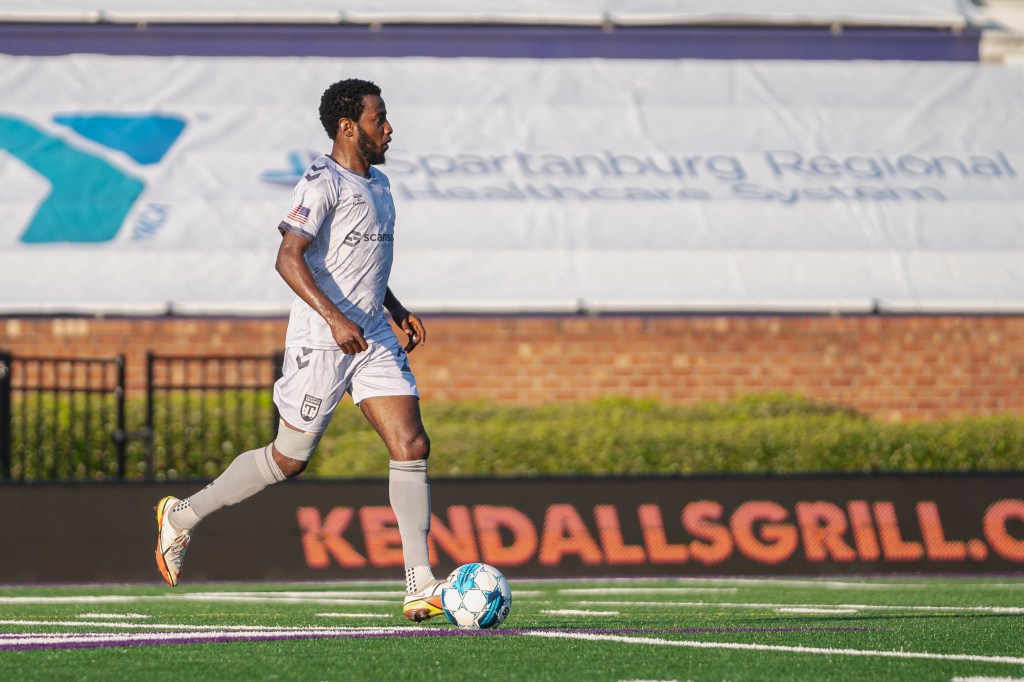 Midfielder, Tevin Shaw dribbles the ball as Greenville earns draw at Colorado.