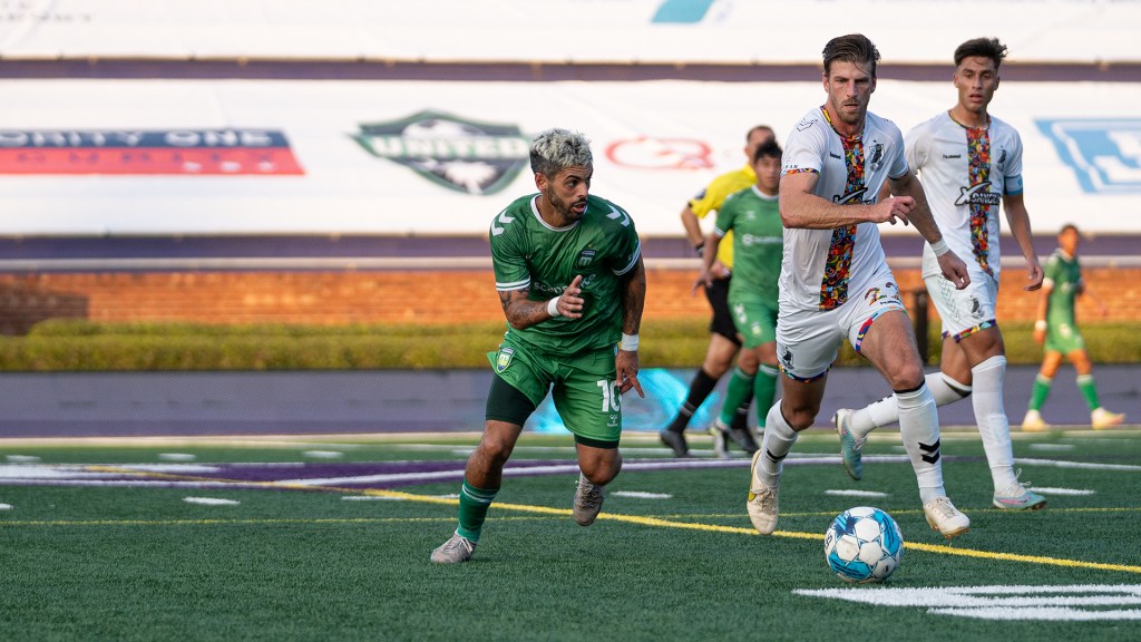 Lucas Coutinho sprints to the ball as Greenville falls to Omaha 2-1.