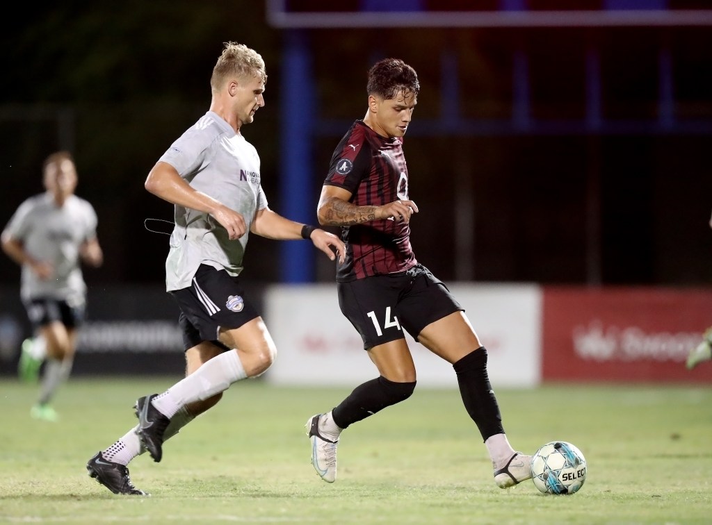 Former FC Tucson forward, Fernando Garcia dribbles against Charlotte.